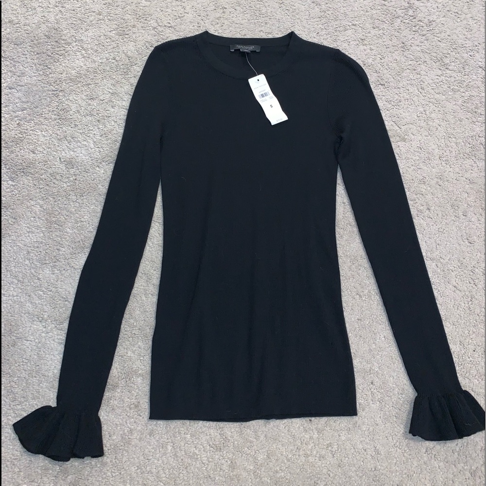 NWT Ann Taylor long sleeve top with ruffled ends!